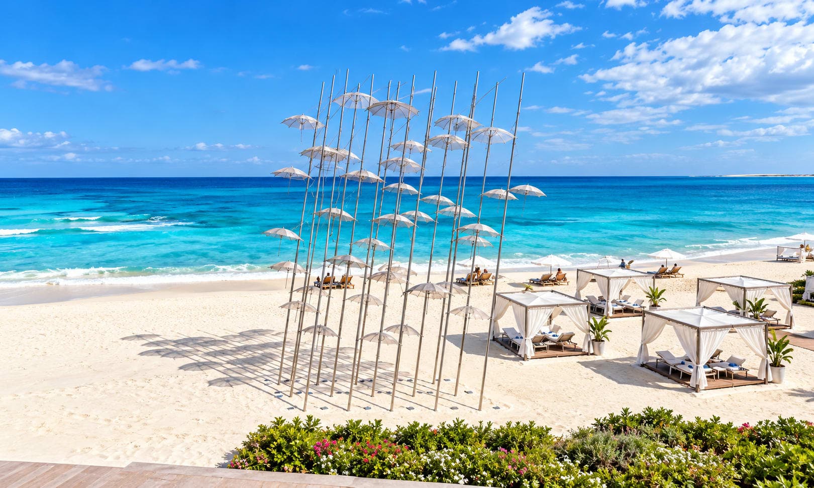 A stylish beachfront area with white cabanas and panoramic Mediterranean Sea views on the North Coast.